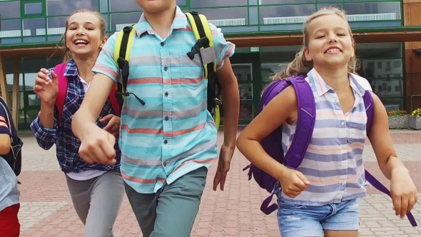 Group Of Happy Elementary School Students Running 24