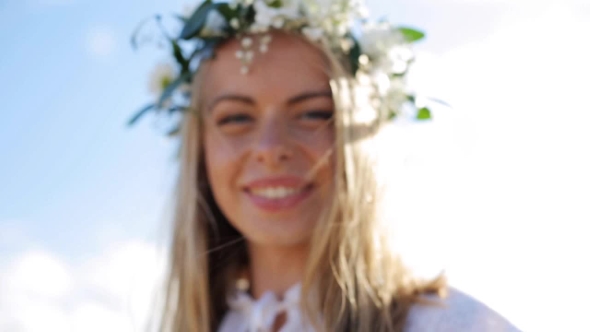 Smiling Young Woman In Wreath Of Flowers Outdoors 1