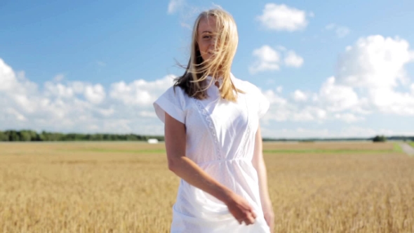 Smiling Young Woman In White Dress On Cereal Field 7