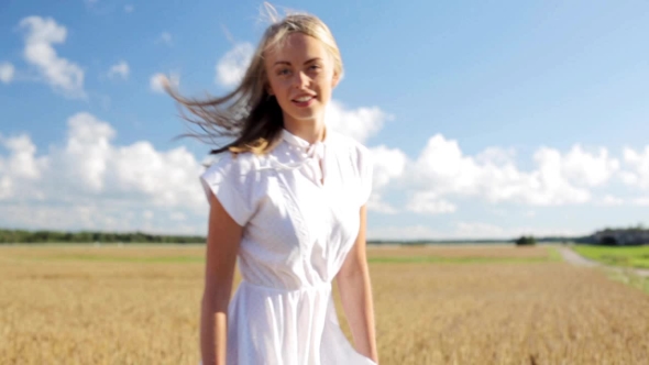 Smiling Young Woman In White Dress On Cereal Field 16