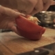 Male Hands Preparing Paprika On a Wooden Cooking Board - VideoHive Item for Sale