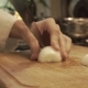 Male Hands Chopping Onion On a Wooden Cooking Board - VideoHive Item for Sale