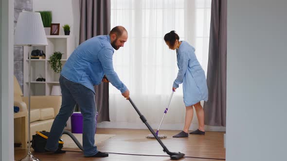 Cleaning Floor with Vacuum Cleaner