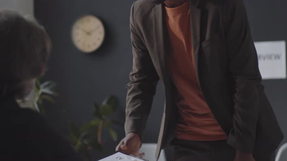 Young Black Man Having Job Interview with HR Manager