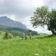 Family with son (8 to 9) in Alpine meadow, Alta Badia, Italy - VideoHive Item for Sale