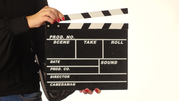 Woman Uses Movie Production Clapper Board, On White