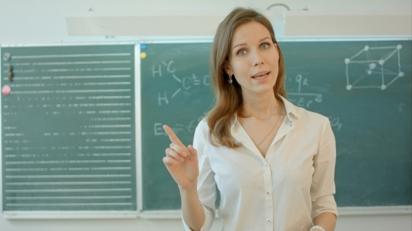 University Teacher Talking Into The Camera alt