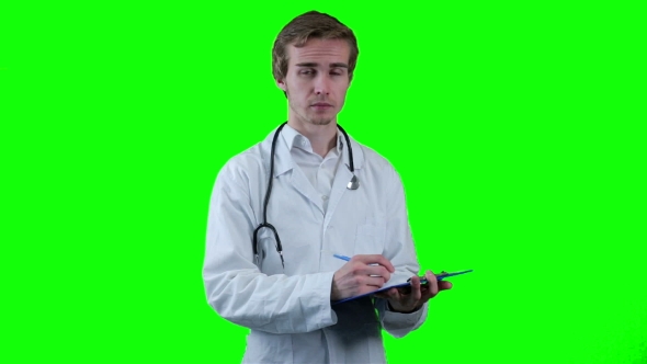 Doctor In a White Coat Writes a Prescription. Chroma Key Background.