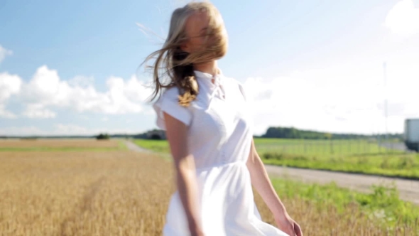 Smiling Young Woman In White Dress On Cereal Field 54
