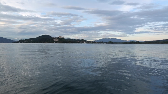 Sunset  Of The Arona City, From Across The River