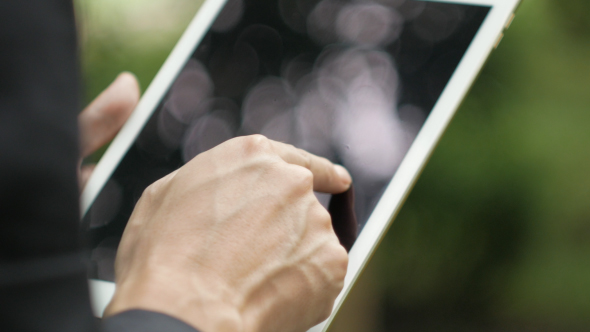 Businessman With Tablet