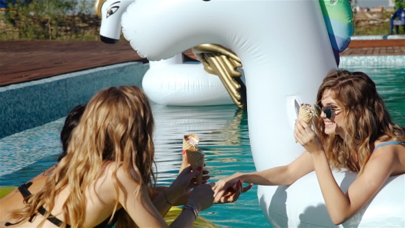 Two Girls Of Swimsuit Floating In The Pool Float. 20S. 1080p 
