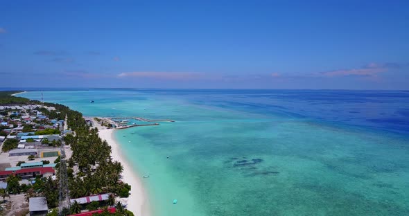 Wide angle aerial abstract view of a summer white paradise sand beach and blue water background