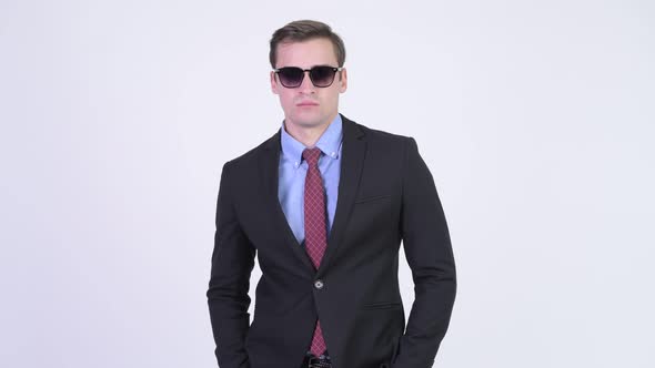 Young Handsome Businessman Wearing Sunglasses