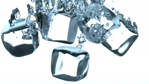 Super Slow Motion Shot of Ice Cubes Falling Into Water at 1000Fps alt
