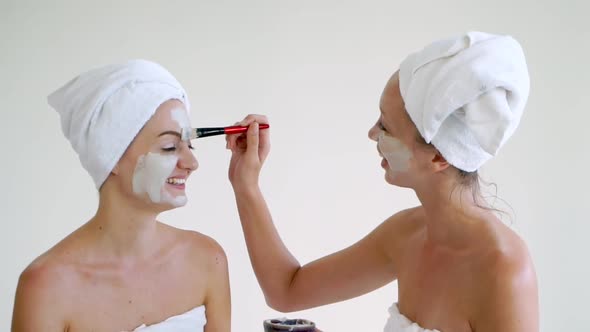 Beautiful Woman Having a Facial Treatment at Spa