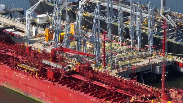 Oil Tanker Ships Unloading Petrochemicals at a Port Depot