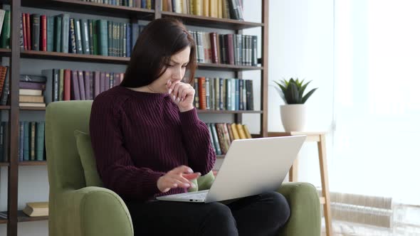 Young Woman Coughing at Work in Office, Cough