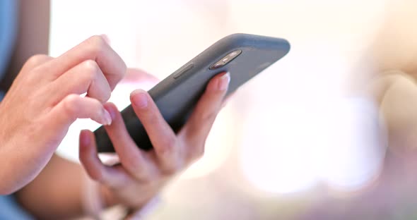 Close up of woman using mobile phone