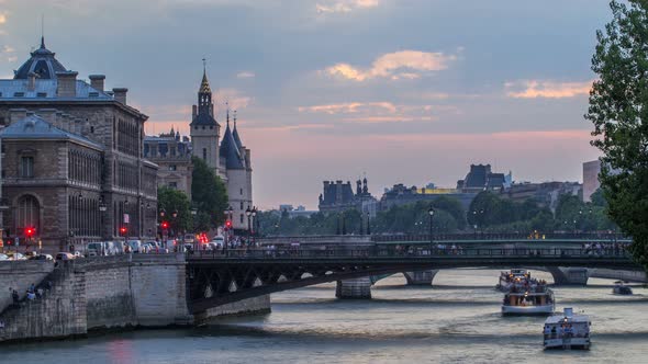 People and Boats Day to Night Timelapse Le Pont D'Arcole Bridge After Sunset Paris France Europe