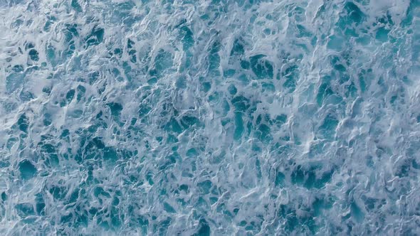 Amazing Overhead Aerial View of Island Shoreline with Waves Along the Ocean