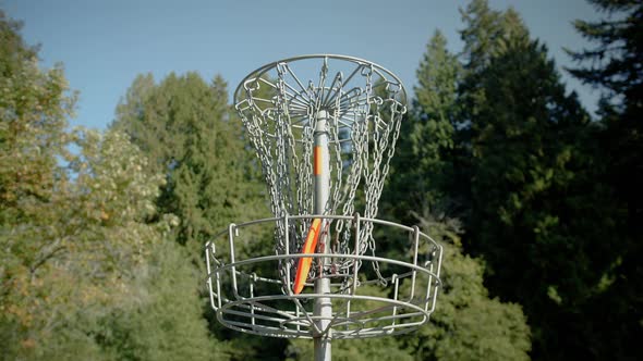 Frisbee Golf Basket Hole With Disk Hitting Chains