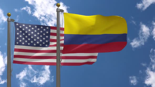 Usa Flag Vs Colombia Flag On Flagpole