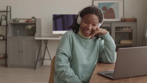 Portrait of Joyful African Girl in the Living Room