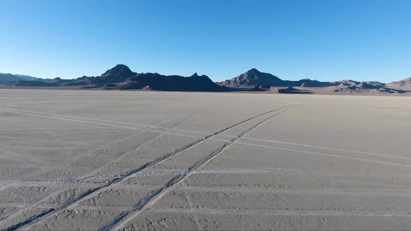 Flying over the Bonneville Salt Flats in Northwestern Utah reveal white salt and tire tracks.