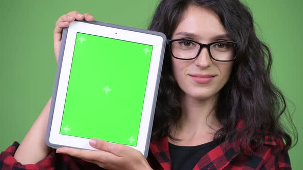 Young Beautiful Businesswoman Showing Digital Tablet