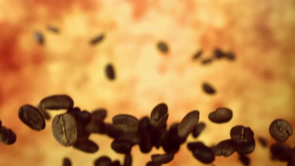 Roasted Coffee Beans Fly on a Yellow Background