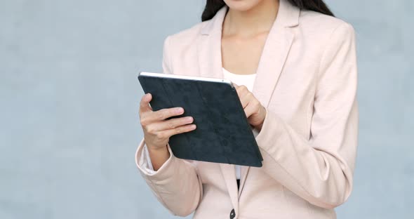 Business woman using tablet computer