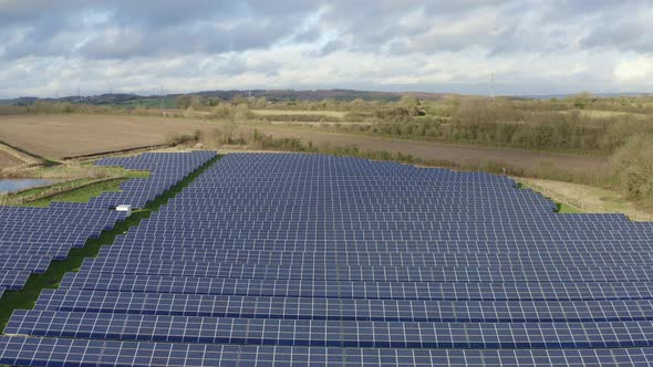 A solar farm in Staffordshire, thousands of Solar Panels capturing the sun's natural light and conve