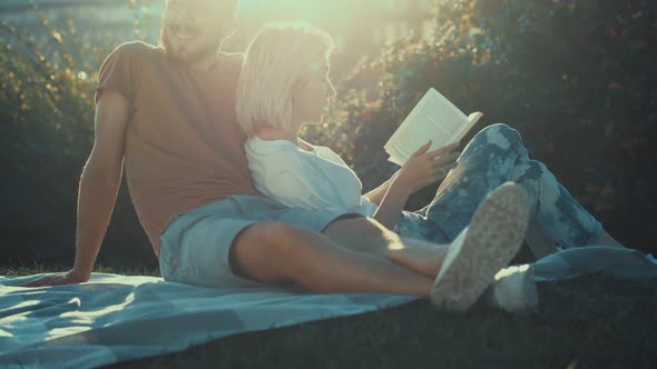 Young couple with a book