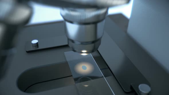Laboratory Microscope Science Research Inspecting Chemical Drop on Sample Slide alt