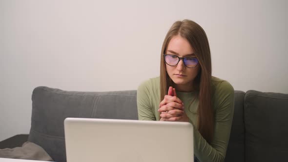 Upset Woman in Glasses Using Laptop Feel Frustrated Mad About Problem Reading Bad News in Social
