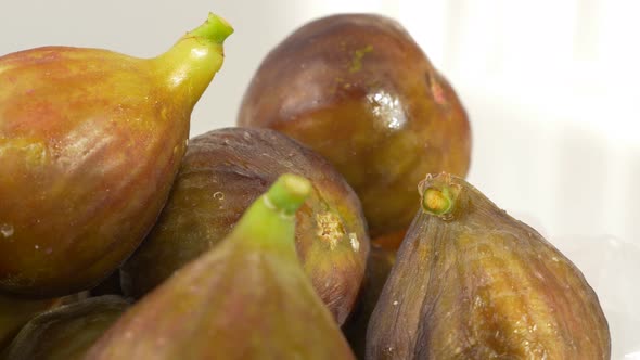 Figs juicy fruit on white background 4K 3840X2160 UHD footage - Figs fruit background 4K 2160p UHD v