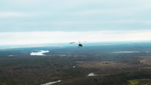 A Hang Glider Flying Over the Countryside