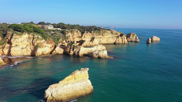 Aerial View of Beautiful Portuguese Beaches with Rocky Sandy Shores and Pure Sand for Tourists