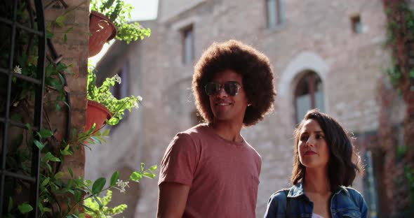 Man and Woman Smiling and Talking Together While Looking at Shop Window in Old town.Tourists Search