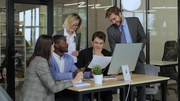 Startup Business Team on Meeting in Modern Bright Office Interior Brainstorming