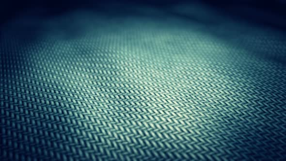 Endless closeup animation of the teal fabric focused in the middle. Loopable. HD