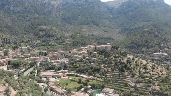 Aerial view of Valdemossa city with mountains of Tramuntana in the background in Mallorca Island, Sp