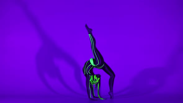 Wide Shot Artistic Gymnast in Neon Costume Dancing in Ultraviolet Light at Background