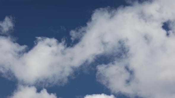 white clouds in blue sky background