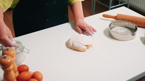 Pastry Chef Cooking at Home in Kitchen