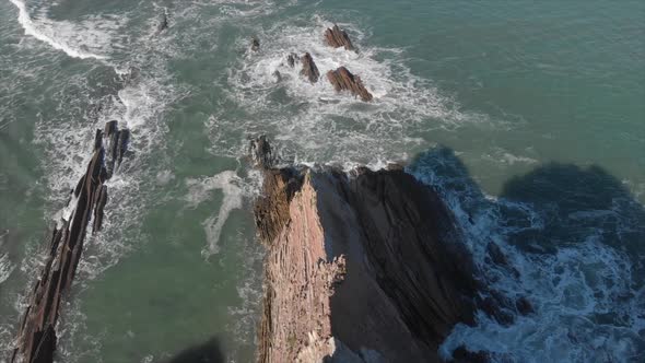 Aerial drone shot of Flysch of Zumaia. (zenith movement) (Basque Country, Spain)