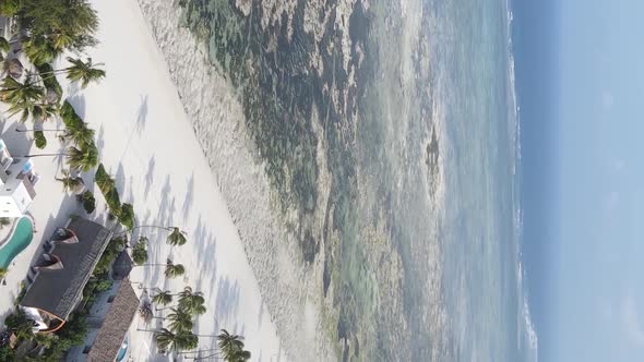 Vertical Video of Low Tide in the Ocean Near the Coast of Zanzibar Tanzania Aerial View