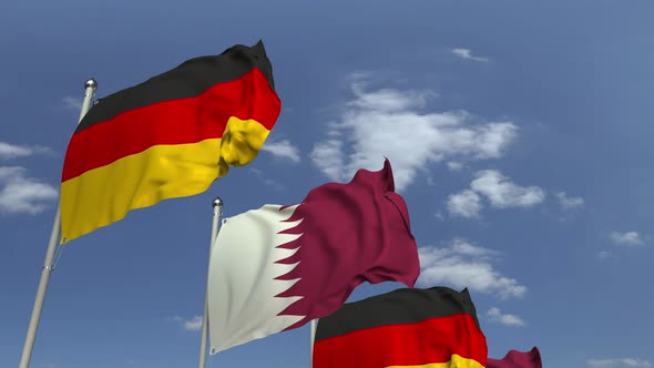 Row of Waving Flags of Qatar and Germany