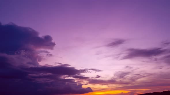 Beautiful Time lapse of Majestic sunrise purple sky landscape.Amazing light of nature cloud sky